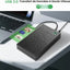 Boîtier de disque dur noir USB 3.0 connecté à un ordinateur portable.